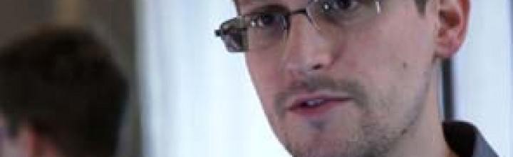 Putin says Snowden is not technically in Russia