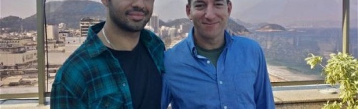 Britain defends detention of journalist's partner